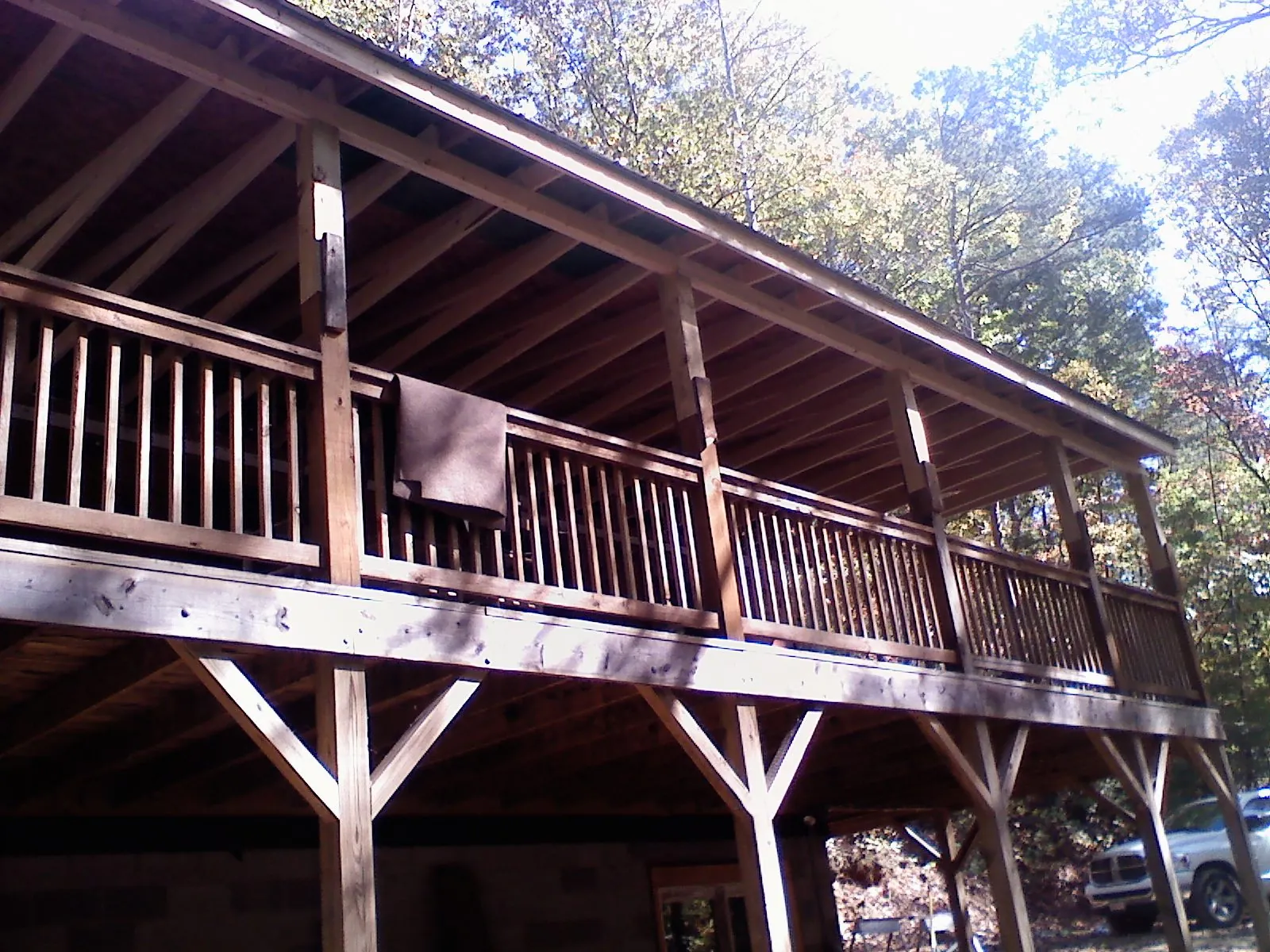 Timber framing under a new elevated porch and deck — Roof Leak Repair in Seth by Roofing Brothers